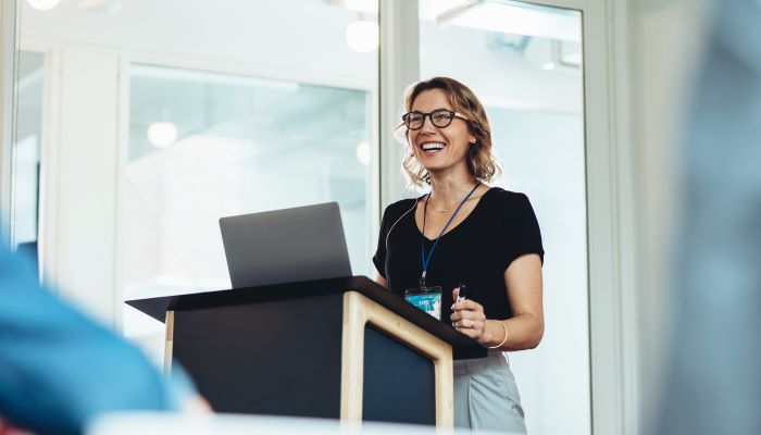 Female business professional making a speech